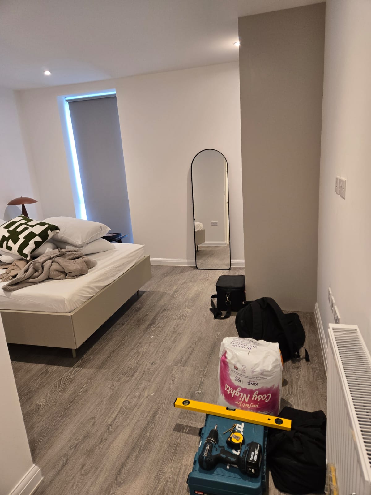 Minor works and snagging activity taking place inside a residential apartment.